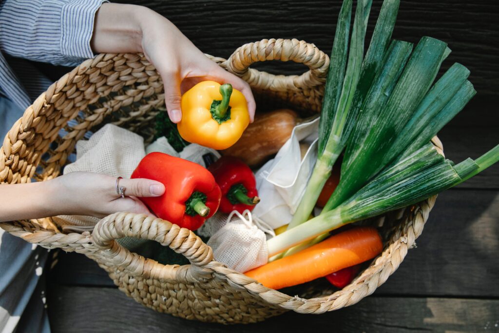 basket filled with harvest vegetables
